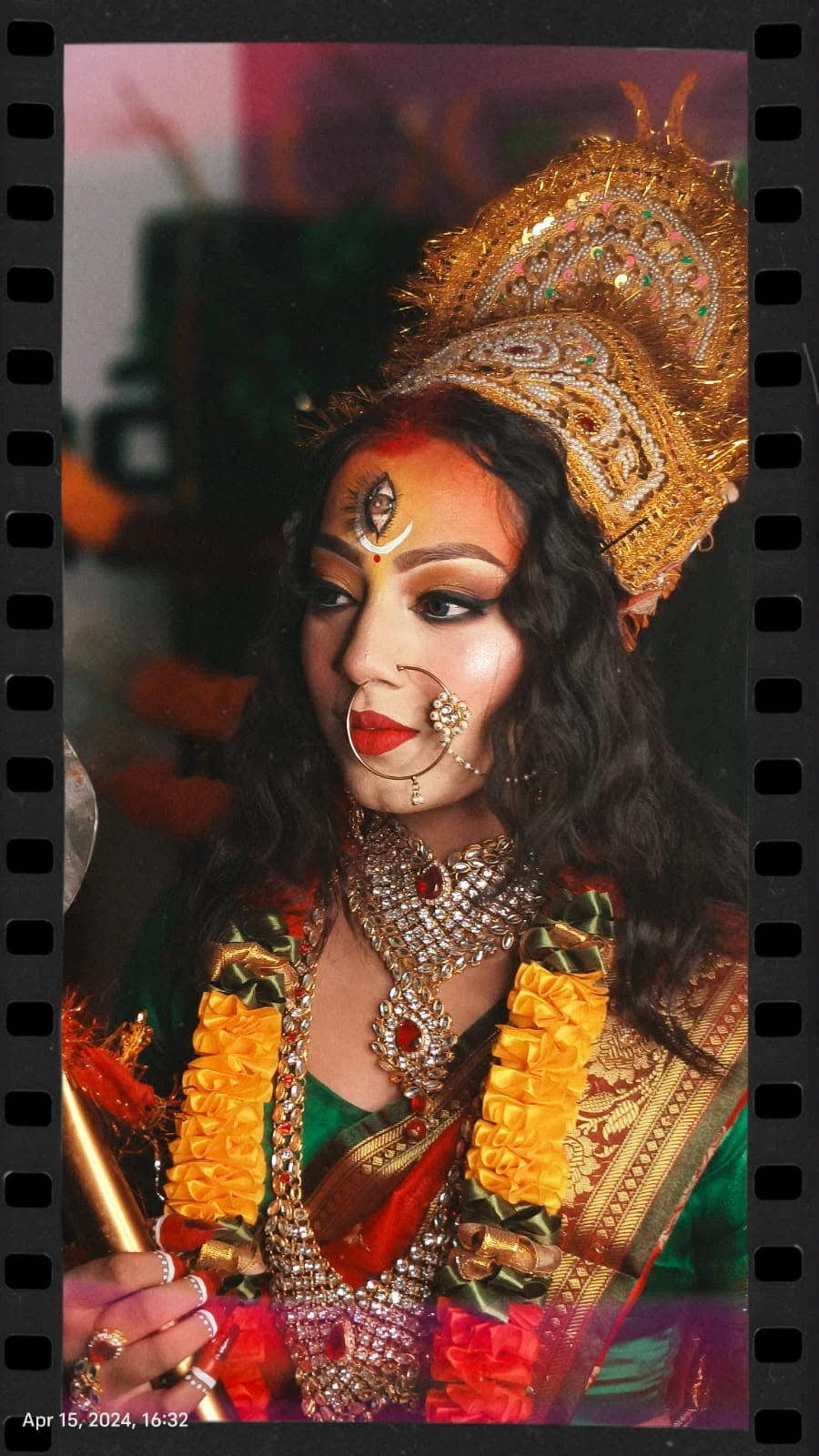 Close-up portrait of Maa Durga theme makeup with precision eye drama and royal crown